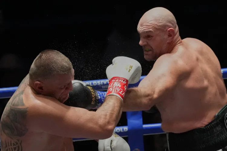 Fury beats Wach in Thailand, awaits big bout with Joshua